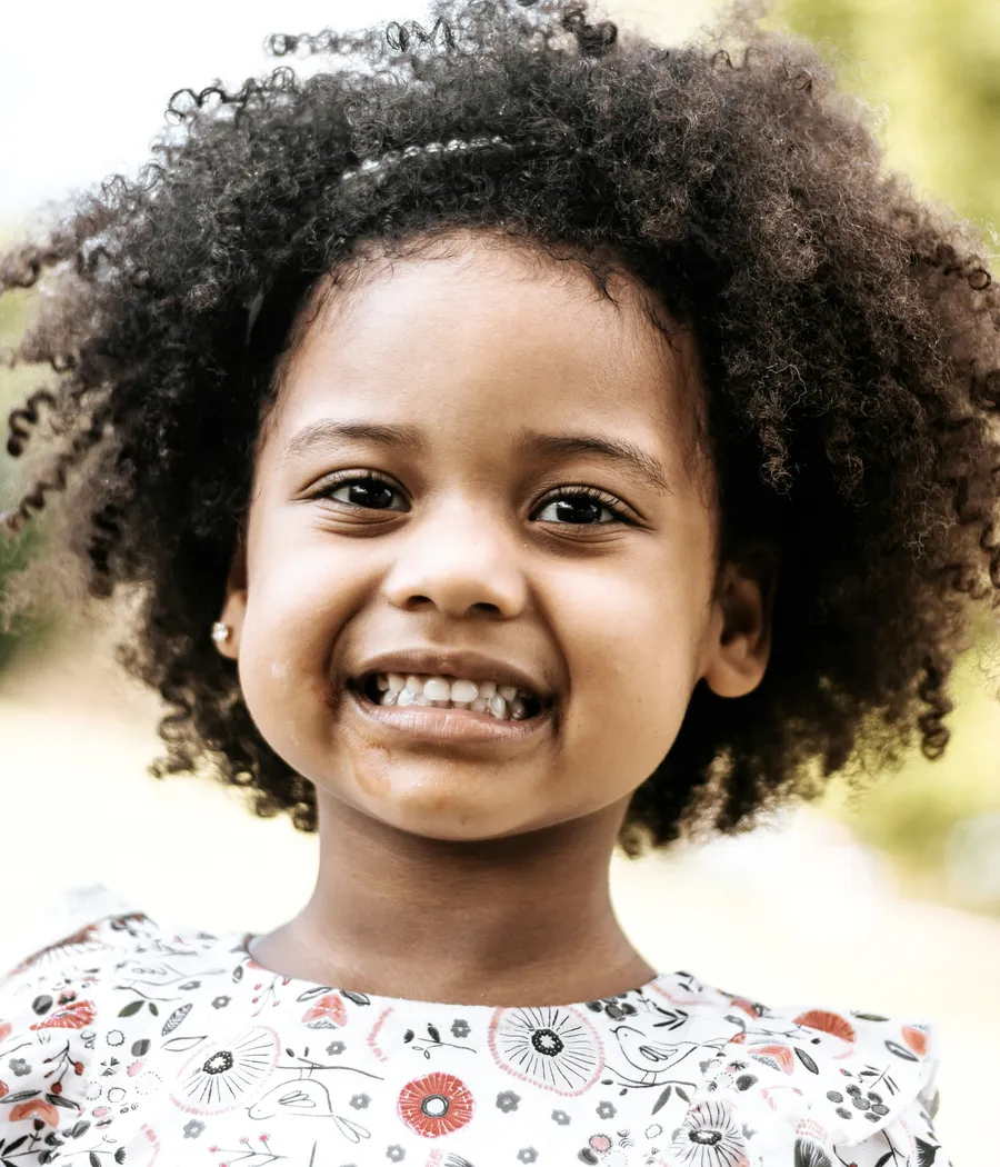 Young child with a bright, healthy smile